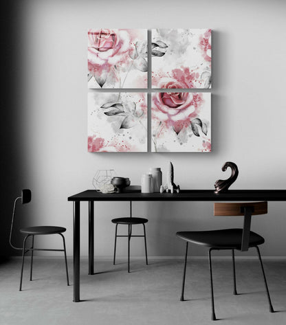 Four-panel glass wall art featuring pink roses and gray botanical elements displayed above a black dining table with chairs.