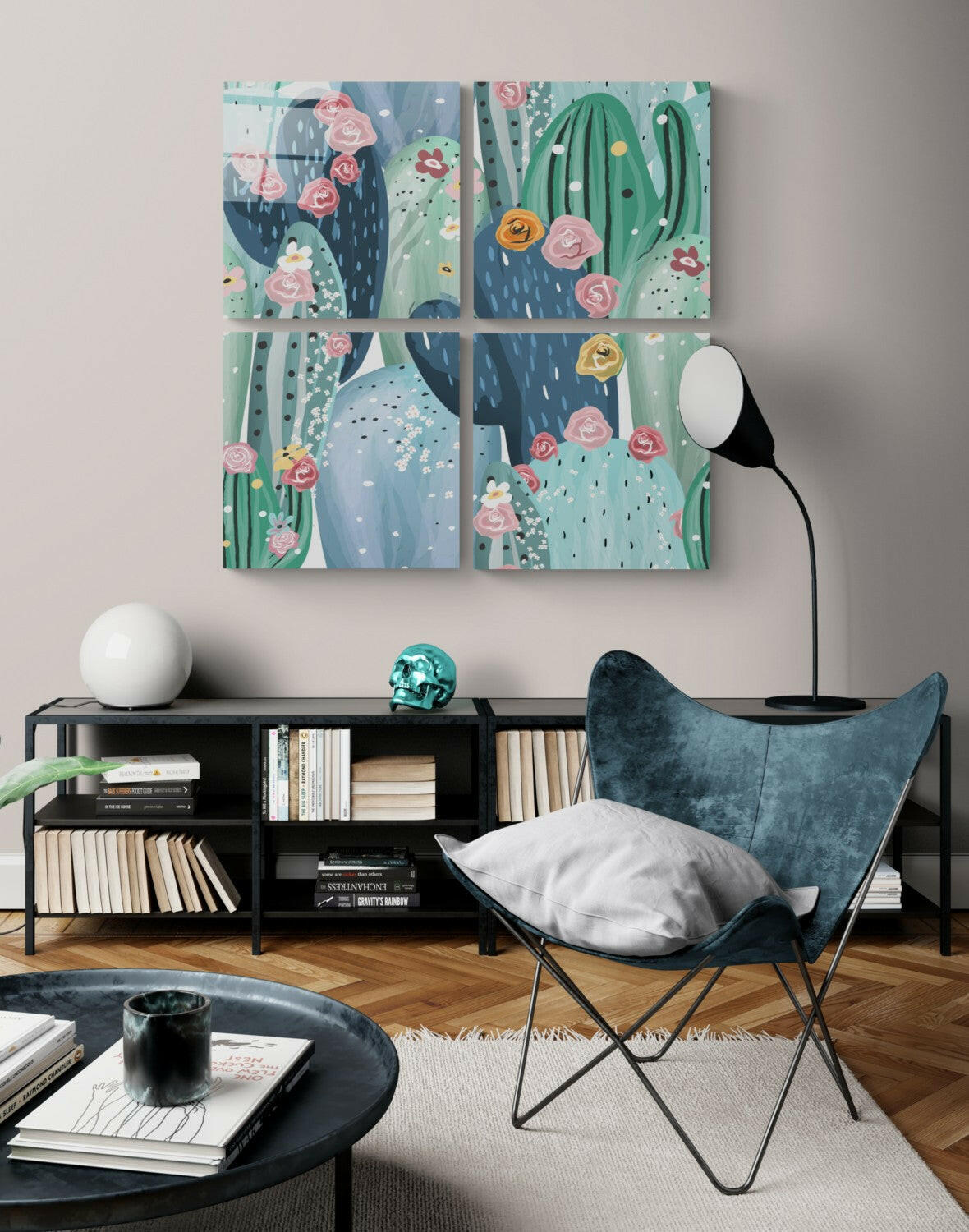 Four-panel glass wall art with illustrated cacti, flowers, and rain in greens, blues, and pinks, displayed above a black shelving unit in a modern living room.