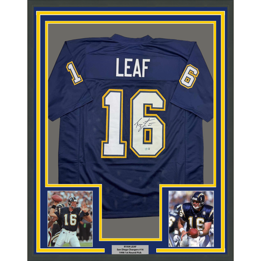 Framed navy blue San Diego Chargers jersey #16 signed by Ryan Leaf, displayed with two action photos and nameplate.