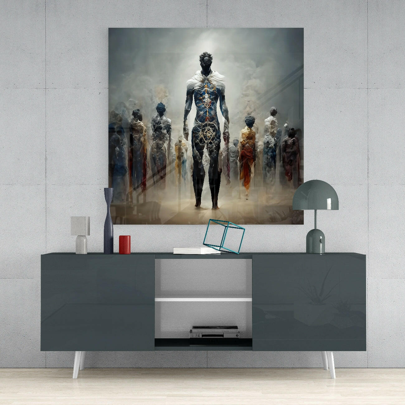 Genesis Glass Wall Art displayed above a dark gray media console, showing ethereal figures with gold and blue accents against a misty background.