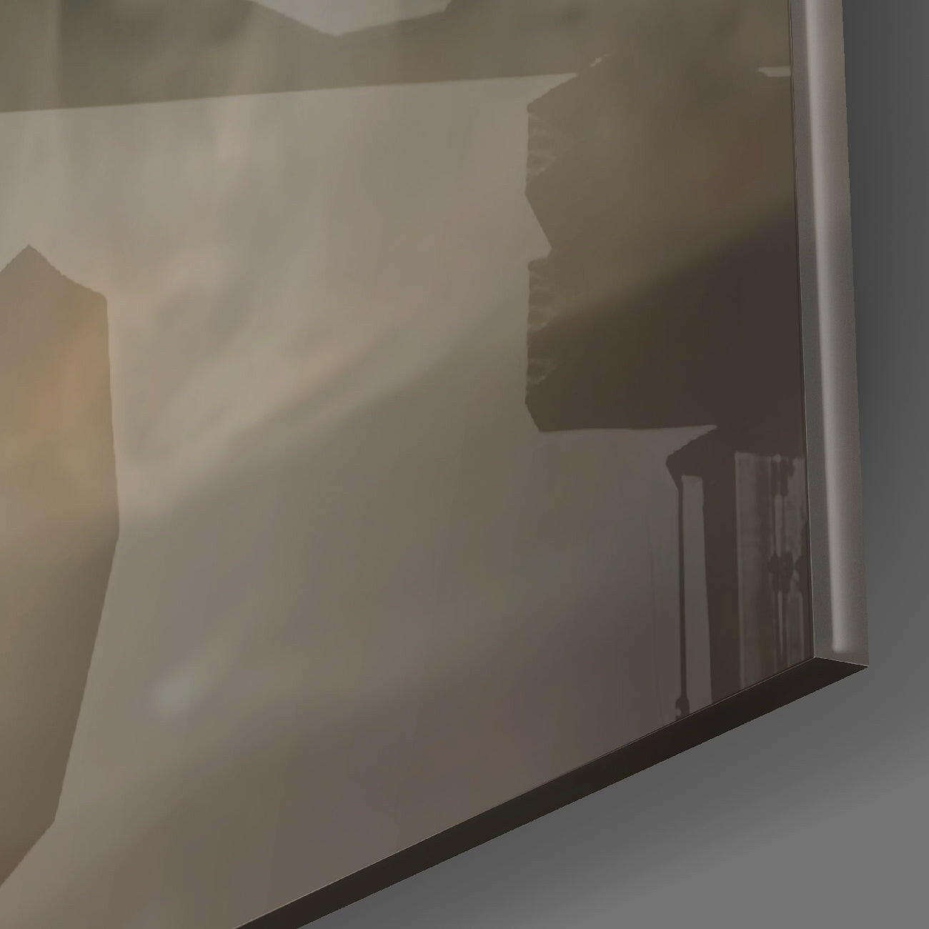 Frosted glass panel with silhouetted architectural cityscape design, photographed at an angle against natural light.