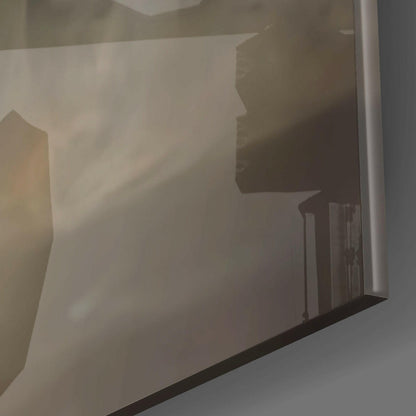 Frosted glass panel with silhouetted architectural cityscape design, photographed at an angle against natural light.