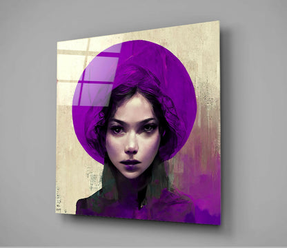 Angled view of glass wall art featuring a portrait of a woman with dark hair wearing a vibrant purple circular hat against a distressed beige background.