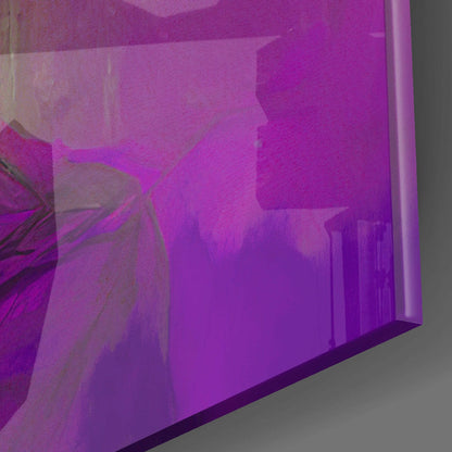 Close-up angled view of purple glass wall art panel showing layered magenta and violet hues with subtle floral silhouettes.