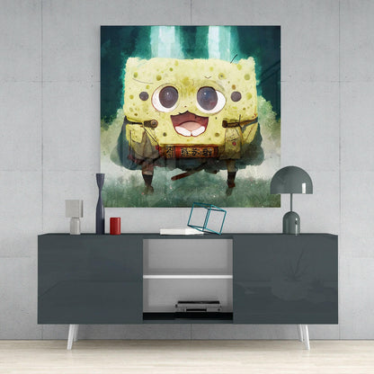 Cheerful yellow cartoon sponge character glass wall art displayed above dark console table in modern room setting.