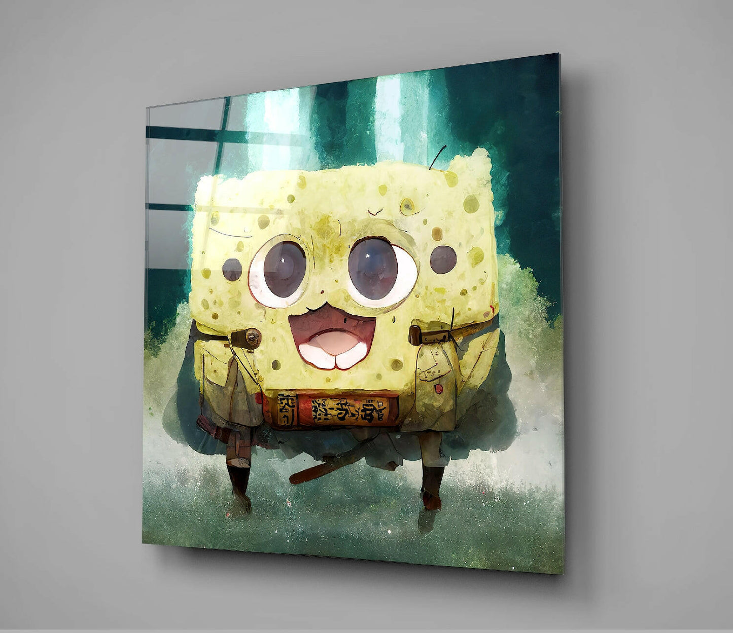 Square glass wall art panel displaying an illustrated yellow sponge character with large eyes and cheerful expression against green watercolor background.