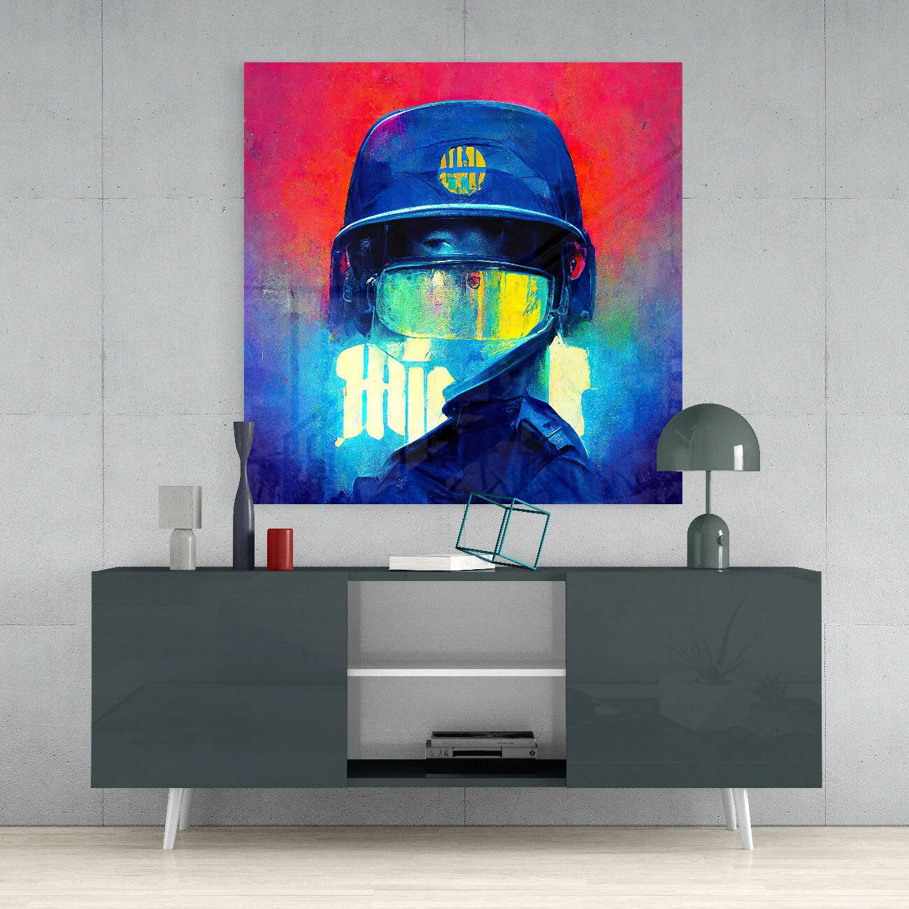 Colorful pop art canvas featuring helmeted figure with neon blue, yellow, and green tones displayed above modern gray media console.
