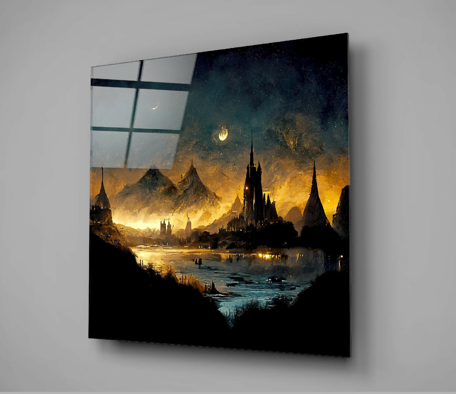 Angled view of glass wall art featuring an illuminated fantasy cityscape with golden light, spires, and mountains reflected through a gridded window pane overlay.