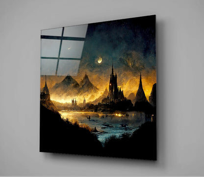 Angled view of glass wall art featuring an illuminated fantasy cityscape with golden light, spires, and mountains reflected through a gridded window pane overlay.