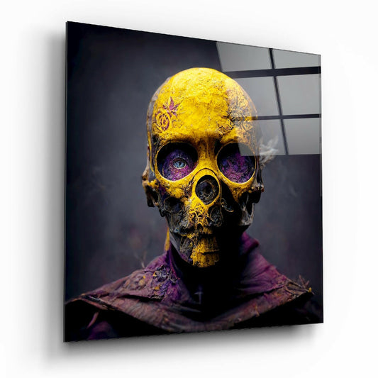 Angled display of gold and purple decorative skull glass wall art mounted on white background, showing intricate detailing and vibrant color contrast.