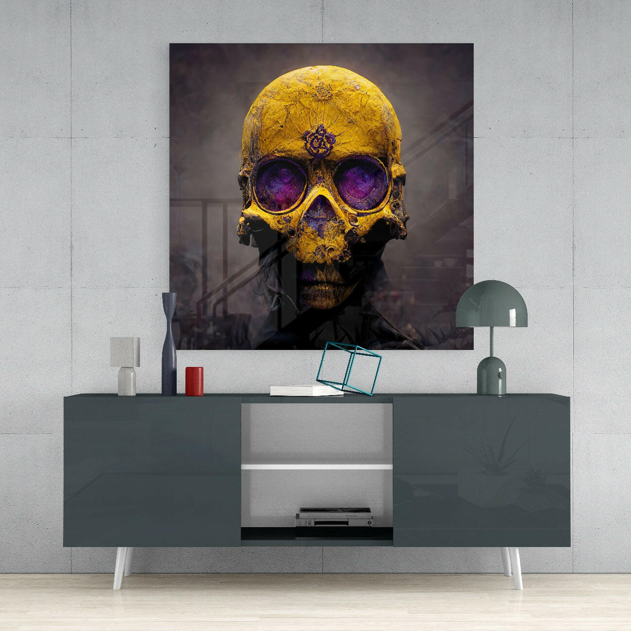 Yellow and gold skull artwork with purple glowing eyes displayed above a dark gray media console in a minimalist interior setting.