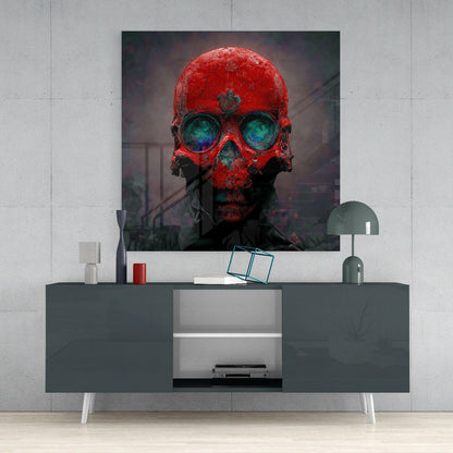 Red skull glass wall art with bright red surface and turquoise eye sockets displayed above modern gray media console.