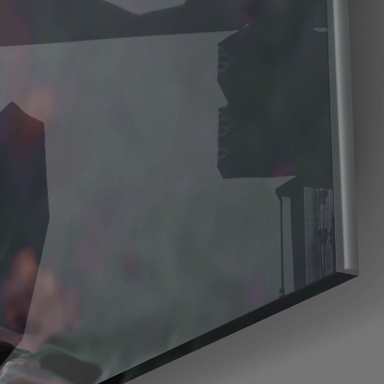 Translucent frosted glass panel displaying silhouetted profile of an orange head against pale background, side angle view.