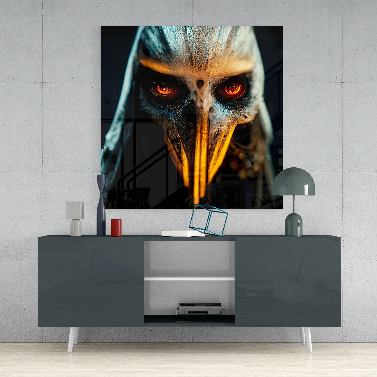 Glass wall art featuring an eagle's head with glowing orange eyes and yellow beak against dark background, displayed above gray media console.
