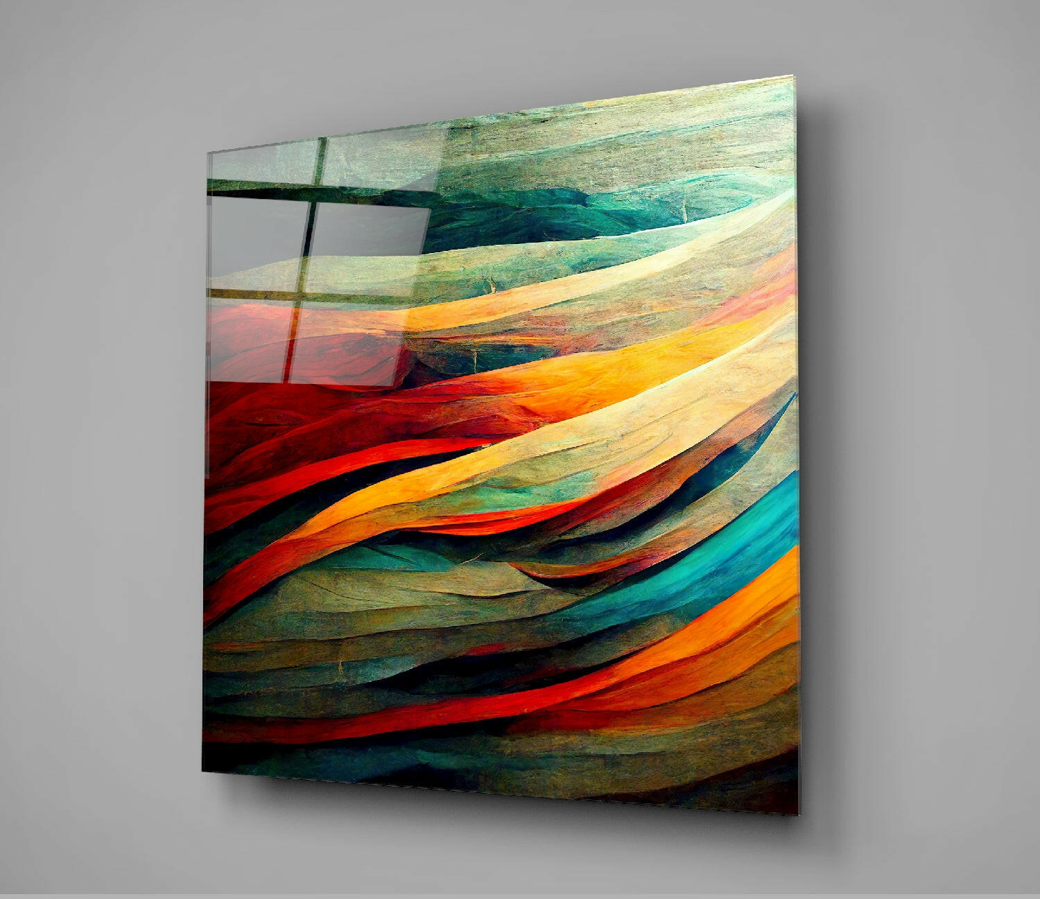 Colorful layered glass wall art with flowing bands of red, orange, yellow, green, and teal painted on wooden strips, displayed at an angle against a gray background.