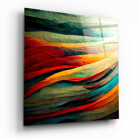 Angled perspective view of glass wall art displaying layered curved stripes in red, orange, teal, green, and cream colors with wood texture.
