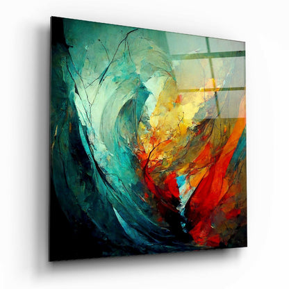 Abstract glass wall art with swirling teal, yellow, orange, and red brushstrokes, displayed at an angled perspective showing three-dimensional depth.