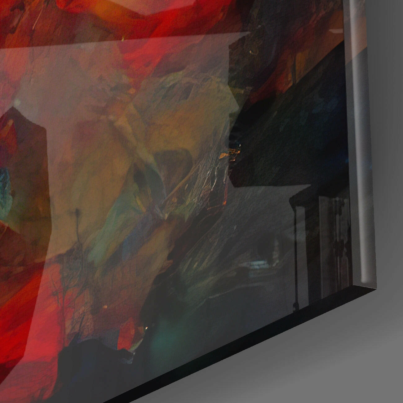 Close-up angled view of Color Jungle glass wall art showing vibrant red, yellow, and dark tones with layered translucent glass panel edge.
