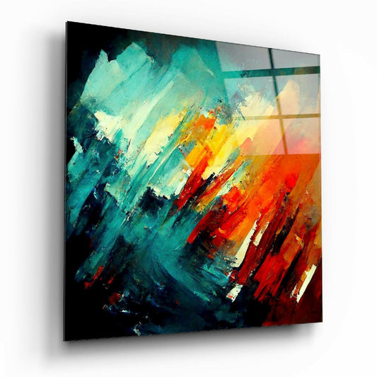 Modern glass wall art panel displayed at an angle showing abstract brushstrokes in teal, yellow, orange, and red against dark backgrounds.
