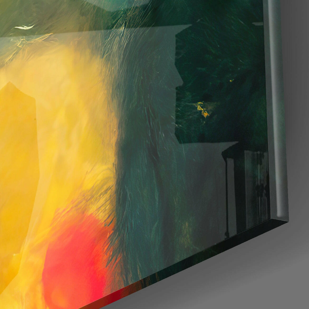 Angled side view of glass wall art panel displaying vibrant yellow, orange, and red gradient transitioning to deep teal and dark green brushstroke patterns.