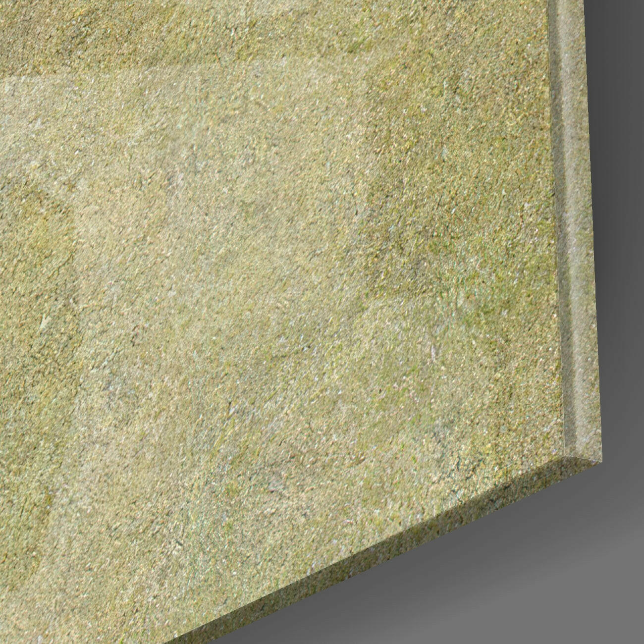 Close-up detail of textured glass surface showing granular beige and cream speckled finish with beveled edge.