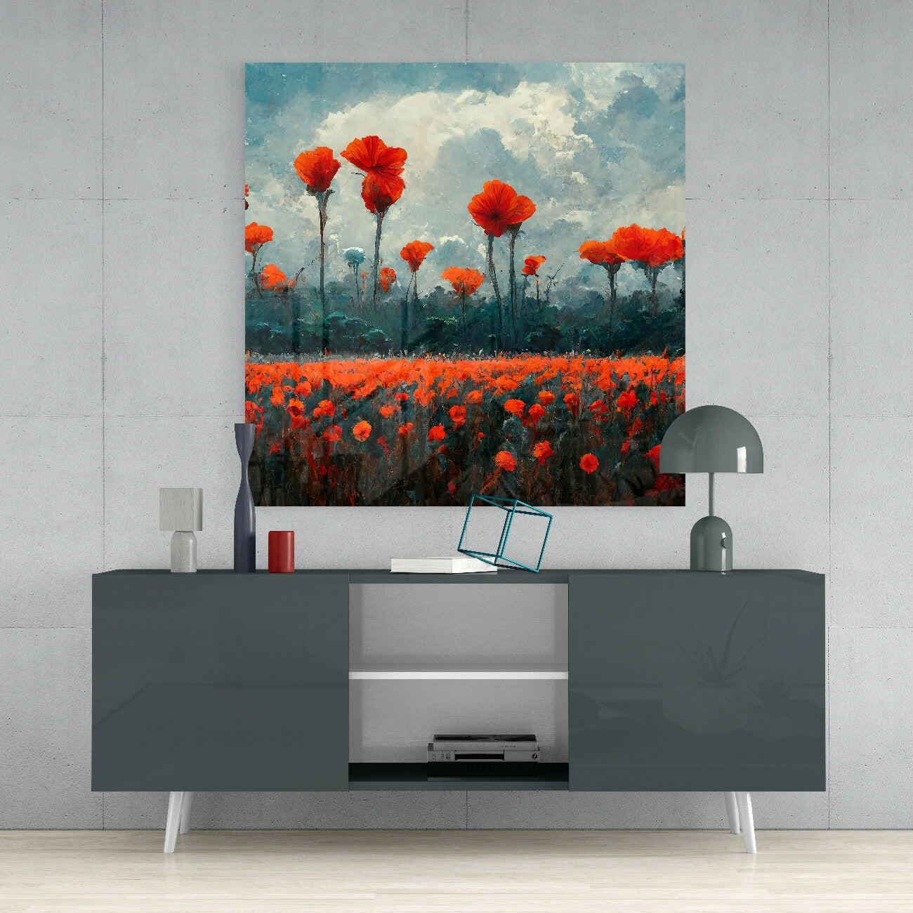 Red poppy field painting displayed above a dark gray media console with white legs in a modern interior setting.