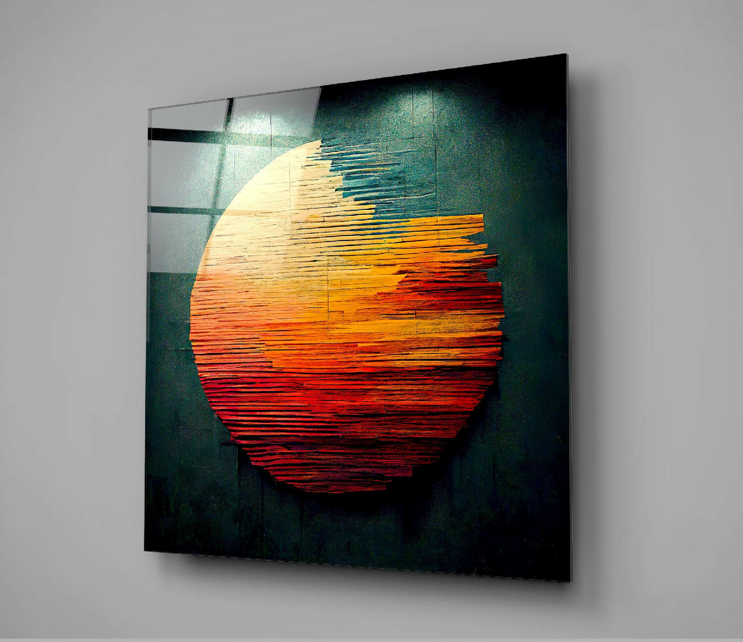 Modern glass wall art featuring a layered circular sun design in cream, orange, and red tones against a dark teal background, mounted on gray wall.