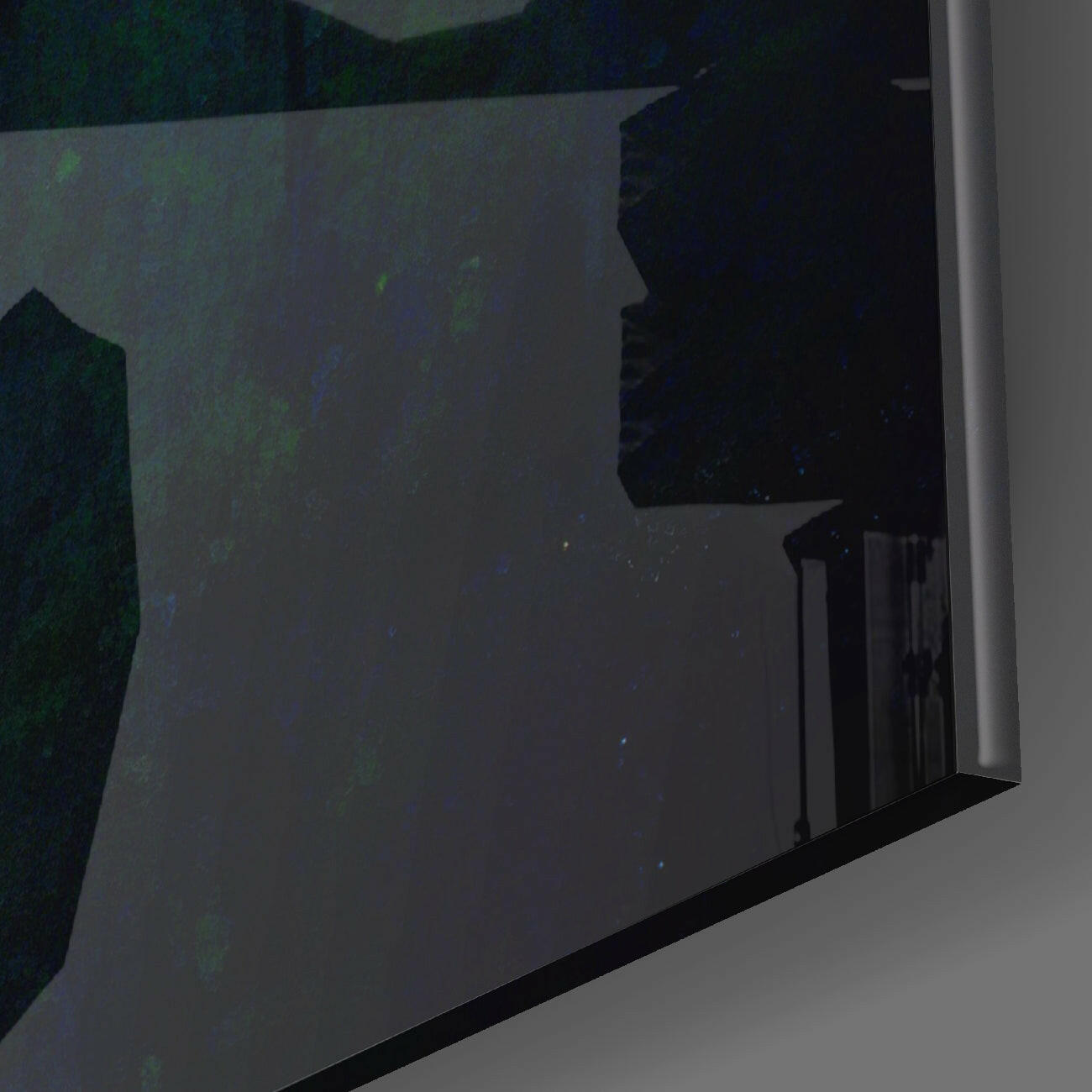 Angled view of dark tinted glass wall art panel mounted on white wall with black frame border visible.