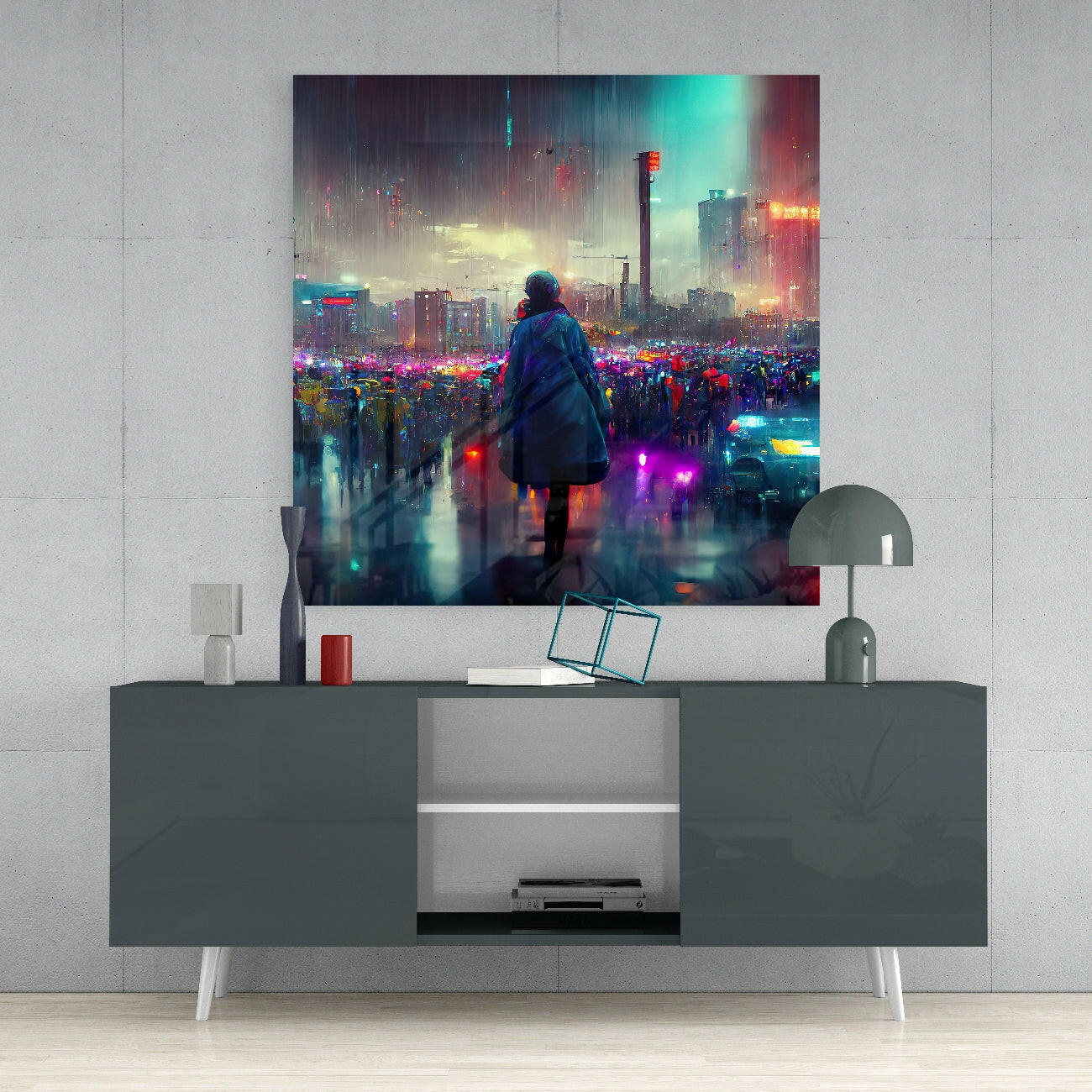 Glass wall art displaying a solitary figure in blue coat overlooking a neon-lit cyberpunk cityscape, mounted above a grey media console.