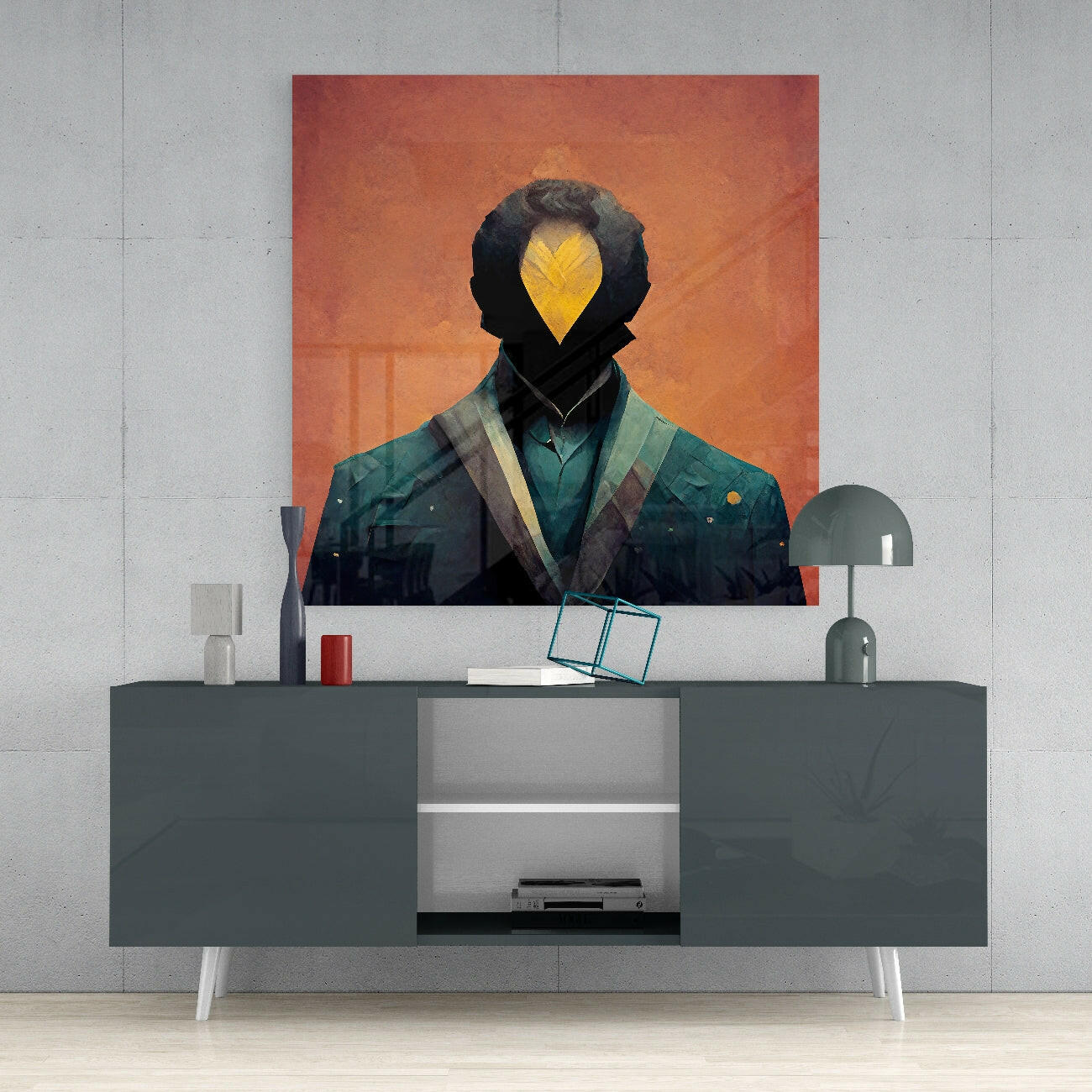 Modern interior scene featuring abstract portrait artwork with yellow leaf-shaped face above mid-century console table with lamp and accessories.