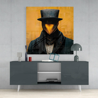 Glass wall art depicting a figure in a top hat with a golden glowing face against a yellow background, displayed above a gray console table.