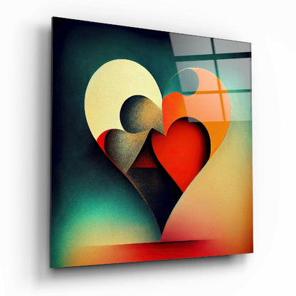 Angled front view of glass wall art featuring layered heart shapes in red, gold, and charcoal against a teal-to-orange gradient background.