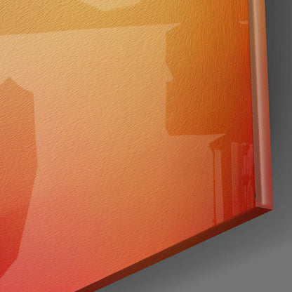 Close-up angled view of red and orange gradient glass panel with beveled edge against gray background.