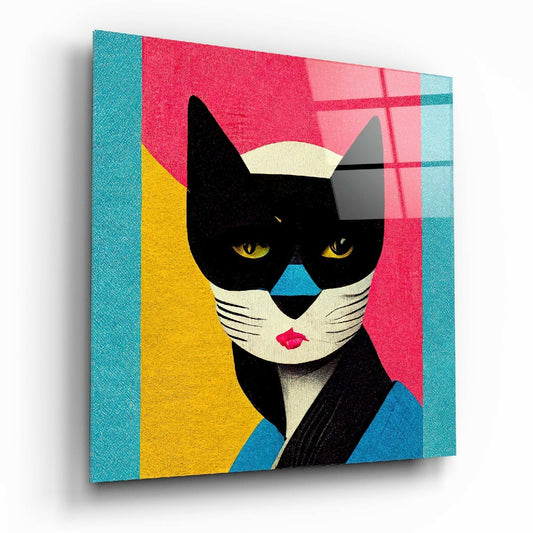 Modern pop art glass canvas featuring stylized black cat face with yellow eyes against pink, yellow, and turquoise geometric background, angled three-quarter view.