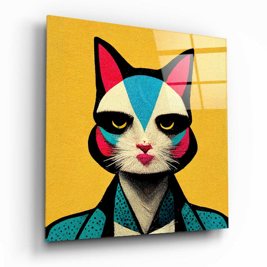 Stylized cat portrait with geometric face paint in red, blue, and cream wearing teal polka-dot jacket against yellow background on glass panel.