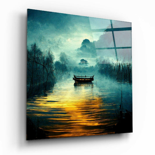 Angled view of glass wall art displaying a misty river landscape with a wooden boat, golden water reflections, and teal-toned distant hills.