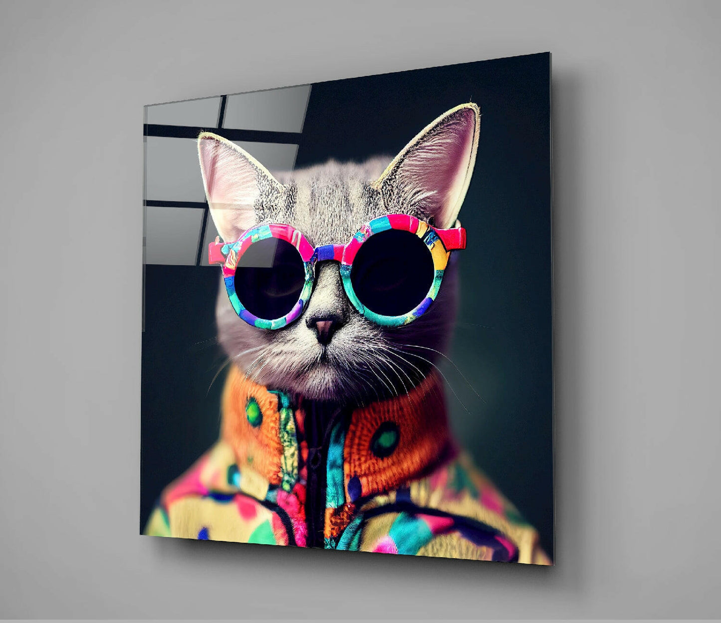 Glass wall art panel displaying a stylized cat wearing colorful rainbow sunglasses and matching patterned sweater against dark background.