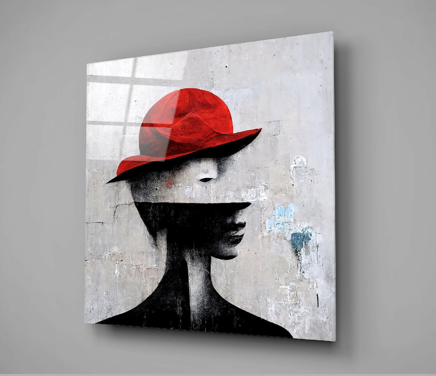 Modern glass art panel featuring a stylized profile silhouette in black with a bold red hat against a weathered concrete textured background.