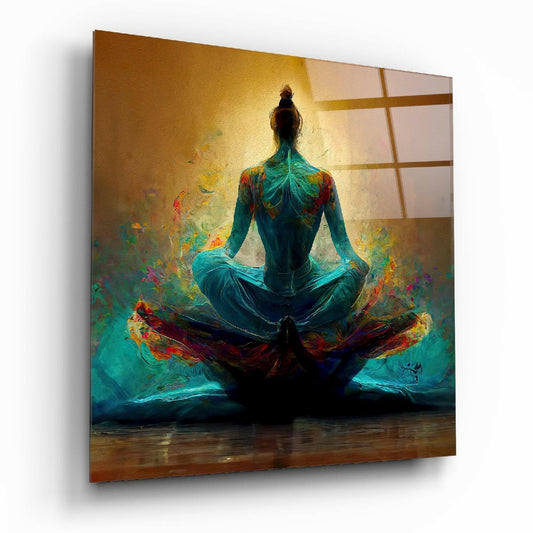 A figure in teal meditating in lotus position with colorful energy swirls, displayed on gold-toned glass wall art at an angle.