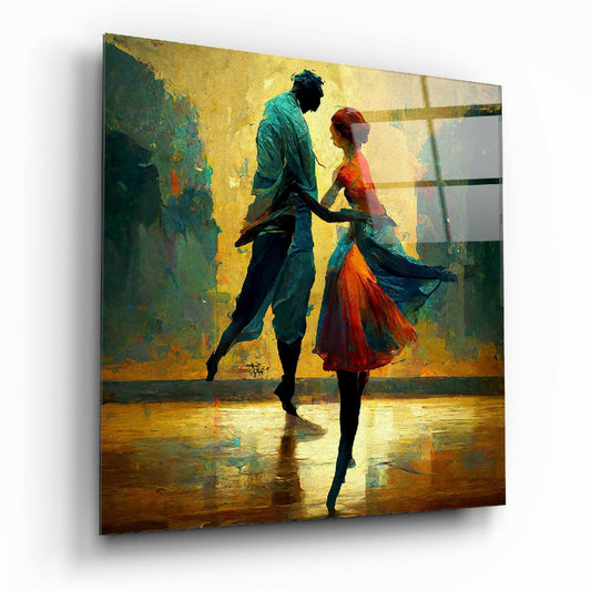 Glass wall art canvas depicting two silhouetted dancers in vibrant yellow, teal, and red tones against a textured background, displayed at an angle showing depth and reflection.