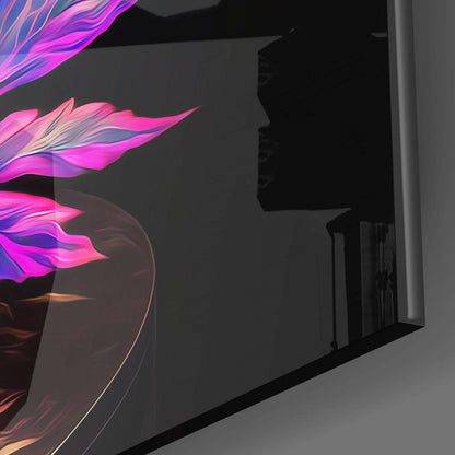 Neon pink and purple glowing glass wall art with flowing flame-like design mounted on dark interior wall.