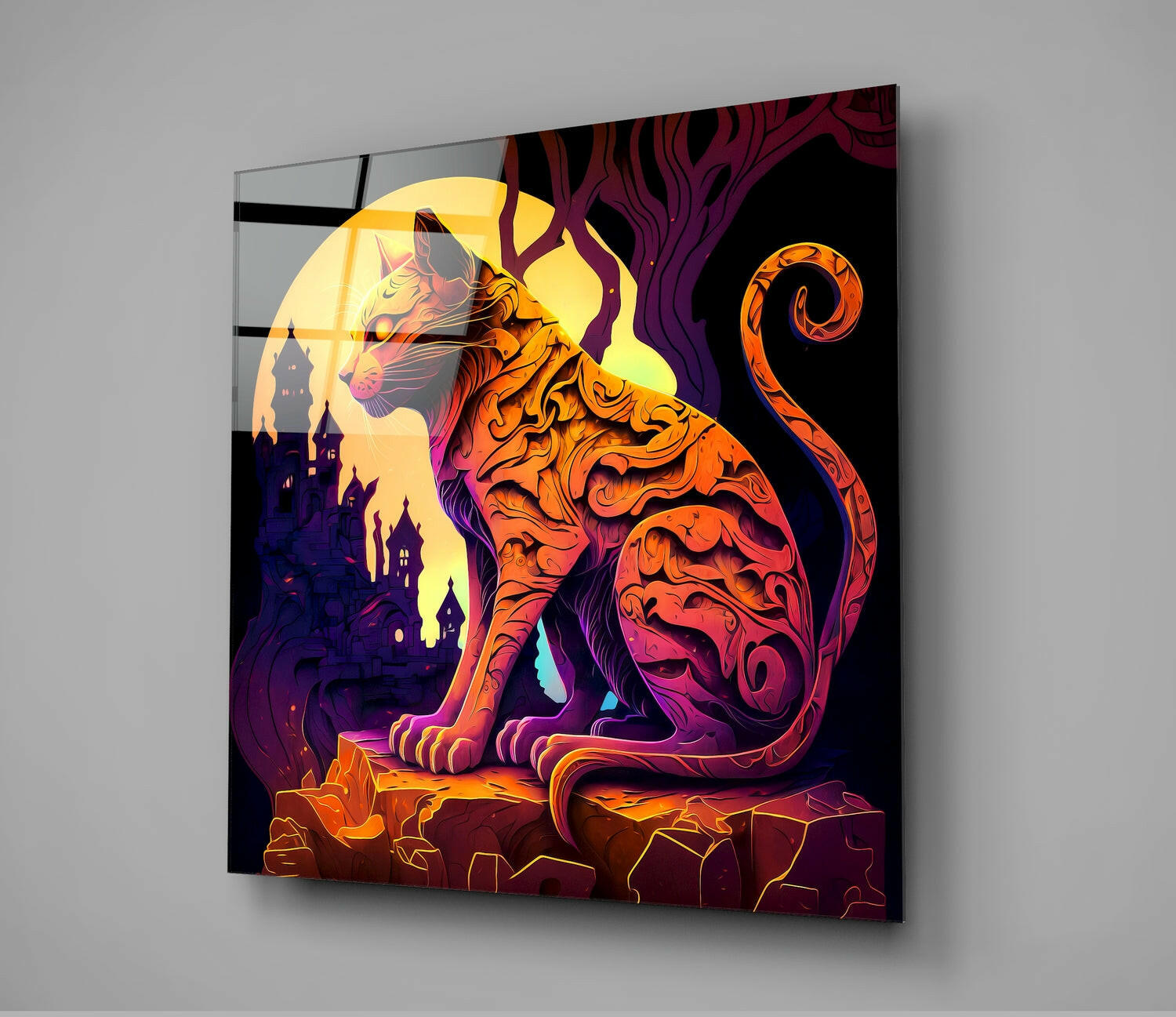 Glass wall art featuring an ornate orange and red cat silhouette against a glowing moon and purple castle backdrop.