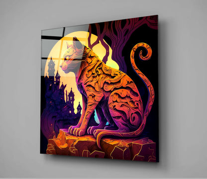 Glass wall art featuring an ornate orange and red cat silhouette against a glowing moon and purple castle backdrop.