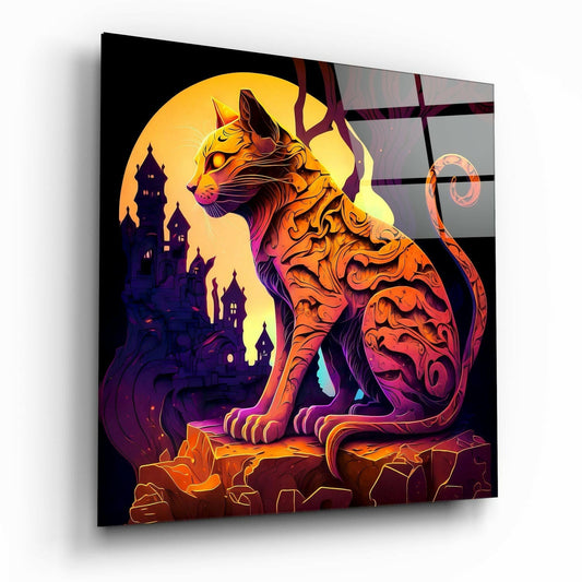 Angled view of a glass wall art panel featuring an ornate orange and red cat silhouette against a full moon and purple castle backdrop.