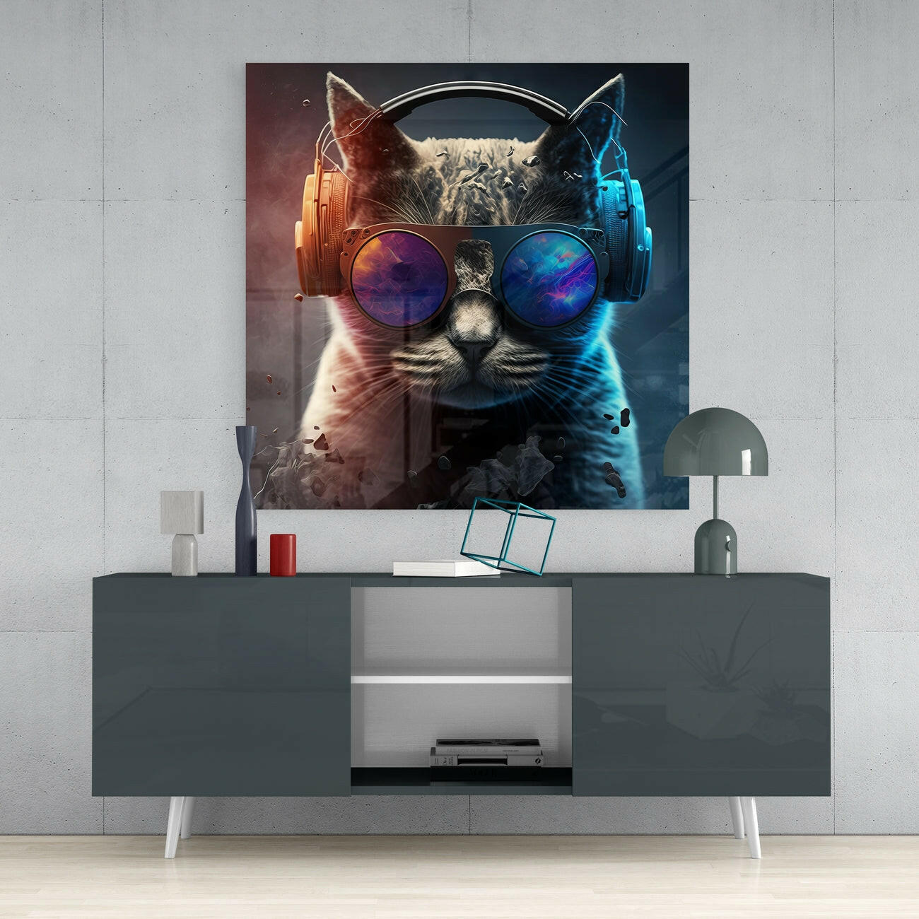 Stylized cat wearing headphones and cosmic sunglasses displayed as glass wall art above gray media console.
