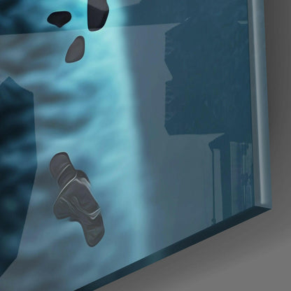 Close-up of frosted glass wall art showing dark brown cat paw prints against translucent blue-tinted glass panel.