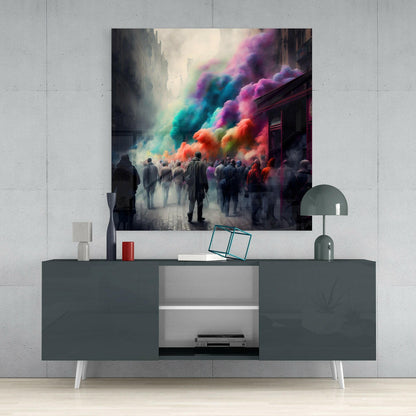 Glass wall art depicting an urban street scene with figures silhouetted against vibrant rainbow-colored powder clouds, mounted above a gray media console.