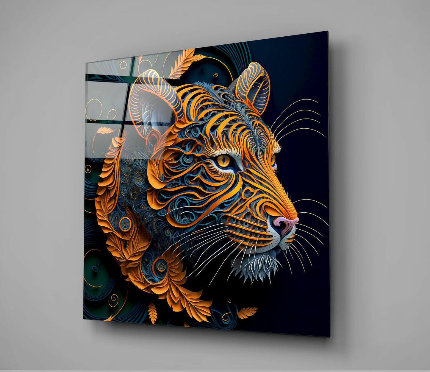 Angled view of decorative glass wall art featuring an intricately layered tiger head in gold, orange, and teal against a dark background.
