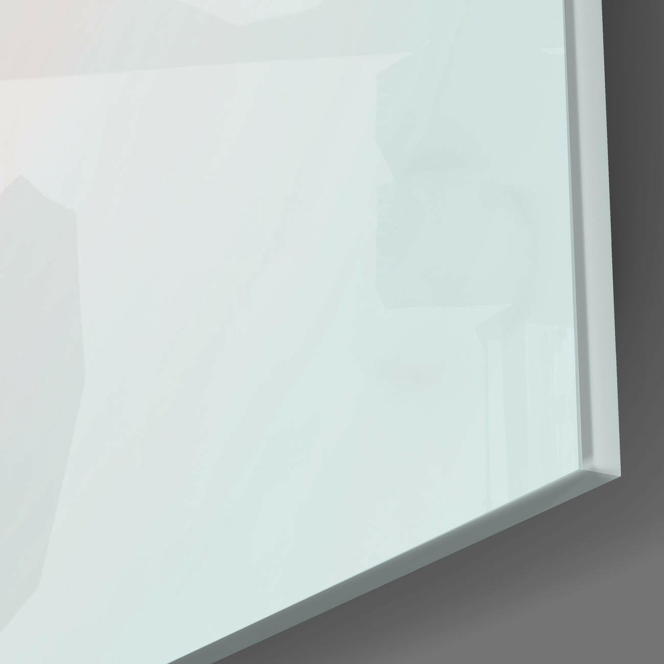 Angled close-up view of white frosted glass wall art panel showing beveled edge and subtle surface texture against gray background.
