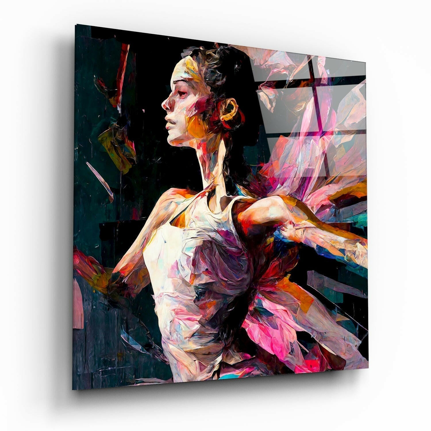 Angled view of glass wall art depicting a colorful ballet dancer in profile with vibrant paint strokes in pink, orange, and teal against dark background.